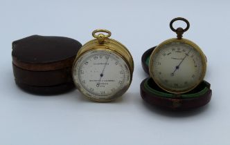 Negretti and Zambra, an Edwardian leather cased pocket barometer/ thermometer with floating compass,