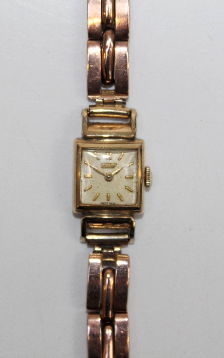 A Tissot gilded ladies wristwatch, with mechanical movement, with a "9ct" stamped rose yellow