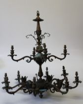 An early 20th century bronze copper and brass twelve branch electrolier. 85cm drop