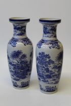 A pair of late 20th century Chinese blue and white transfer decorated floor vases, 60cm high