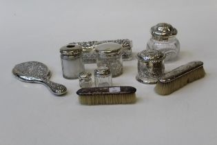 A Victorian silver powder jar and cover of cylindrical form, London 1891, together with a hand