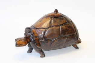 A large Eastern hardwood tortoise with covered storage to top the shell, 70cm long