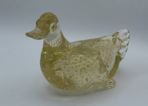 A large Murano amber/gilt speckled glass duck. 16.5 x 25cm