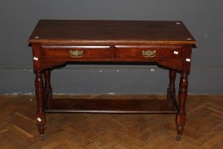 An Edwardian mahogany two drawer side table, 106cm wide