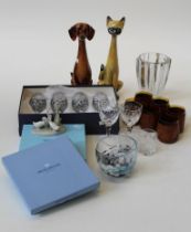 A mixed lot of glassware including champagne coups, wines, leather cased beakers together with a