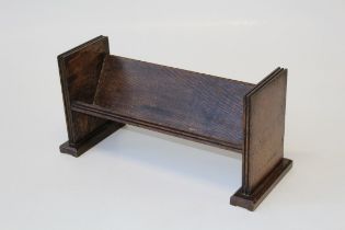 An early 20th century oak book trough 22 x 47 x 18cm