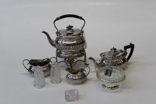 A collection of EPNS tableware comprising a Spirit kettle, a bachelor's tea set and other items