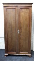 An Edwardian mahogany wardrobe, two panel doors, enclosing shelf and rail, on ogee bracket feet, 200