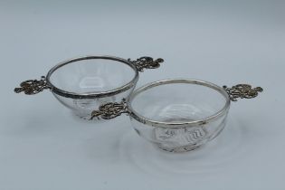 William Comyns and Sons Ltd, a pair of Victorian silver mounted glass quaich, each with pierced