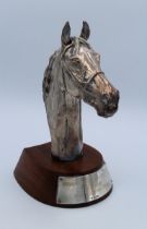 A hallmarked silver covered equestrian steeplechase trophy. Presented for the 2005 Cheltenham