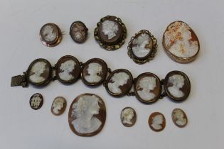 A collection of shell cameo jewellery featuring a 5 x 4cm approximately, shell cameo of floral deity