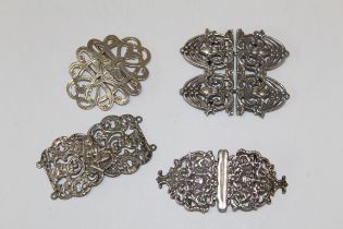 A Victorian pierced silver two piece buckle by Corke, London 1899, together with two other silver