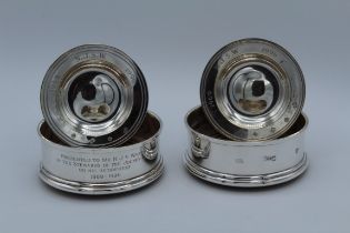 A pair of silver bottle coasters, of small size with Jockey Club presentation inscription, London