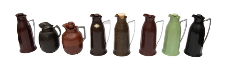 A collection of 20th century bakelite thermos jugs, one without stopper, chrome handles, various
