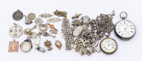 A collection of silver and white metal jewellery to a silver charm bracelet with various charms