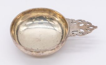 An early 20th century American hand wrought Arts & Crafts silver tasting cup, of circular form