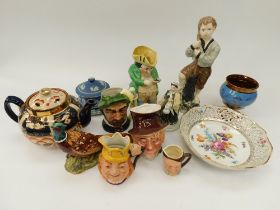 A mixed collection of Staffordshire and Continental china and porcelain including; Toby jug,