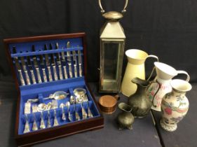 Boxed cutlery sets, decorative metal jugs, stainless steel lamp