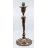 An Edwardian silver table lamp, urn shaped socle above tapering stem on circular base, hallmarked by