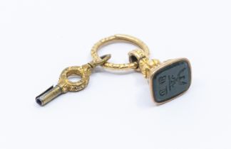 A Georgian yellow metal seal fob, with carved bloodstone intaglio, also suspending a pocket watch