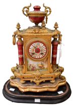 A Continental probably French ceramic dial and detailed gilt brass mantel clock, decorated with