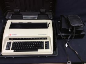 A 1990's cased typewriter plus three sets of modern binoculars