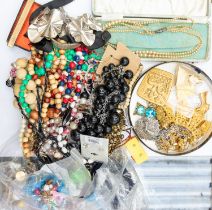 A collection of vintage costume jewellery to include various plastic and glass bead necklaces, paste