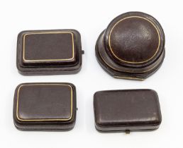 A collection of four leather bound antique jewellery boxes, to include bangle, pendant and brooch (1