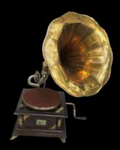 A wind up gramophone and brass horn, HMV.