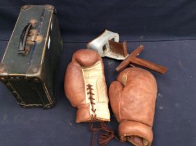 A pair of vintage boxing gloves, a Victorian 3D card viewer and a small early 20th century