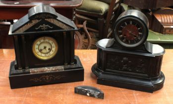 Two late 19th century black slate and marble French 8-day mantel clocks, one with putti detail (2)