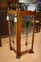 Early 20th century stained leaded glass room screen in mahogany frame