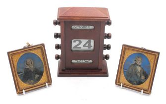 1930s Art Deco- style mahogany desk calendar together with two large 19th century frame photo