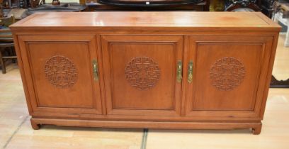 Chinoiserie style hardwood sideboard, having three doors to reveal cupboard and eight cutlery