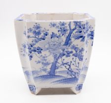A Japanese blue and white porcelain jardiniere circa 1900-1910, painted with a blossoming cherry