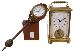 Two mid 20th century German clocks, i.e. a wall clock and carriage clock