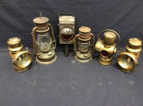 Early 20th century Lucas King of the road brass car oil lamps, tilley lamps and carriage lamp.