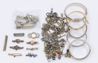 A collection of silver and white metal, to include hinged bangles, chains, sweetheart  brooches,