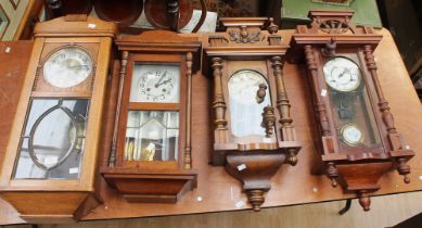 A collection of early to mid 20th century mahogany and oak 8-day wall clocks (4)