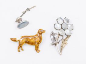 A collection of vintage jewellery to include a moonstone spray brooch in white metal, along with a