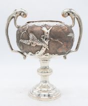 A Chinese white metal rose bowl, having a knopped stem and circular footed base leading to a