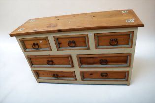 A painted antique pine chest of three above four drawers, 145 x 90 x 48cm, along with a mid 20th