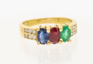 ***AUCTIONEER TO ANNOUNCE CHIPS TO EMERALD ABRASIONS TO STONES*** A three stone sapphire, ruby and