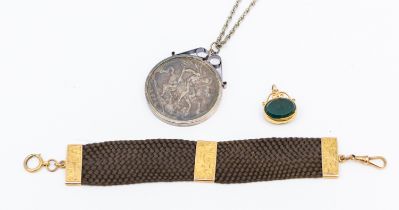 A Victorian 9ct gold mounted hair plait fob, suspending 9ct double fob seal set with bloodstone