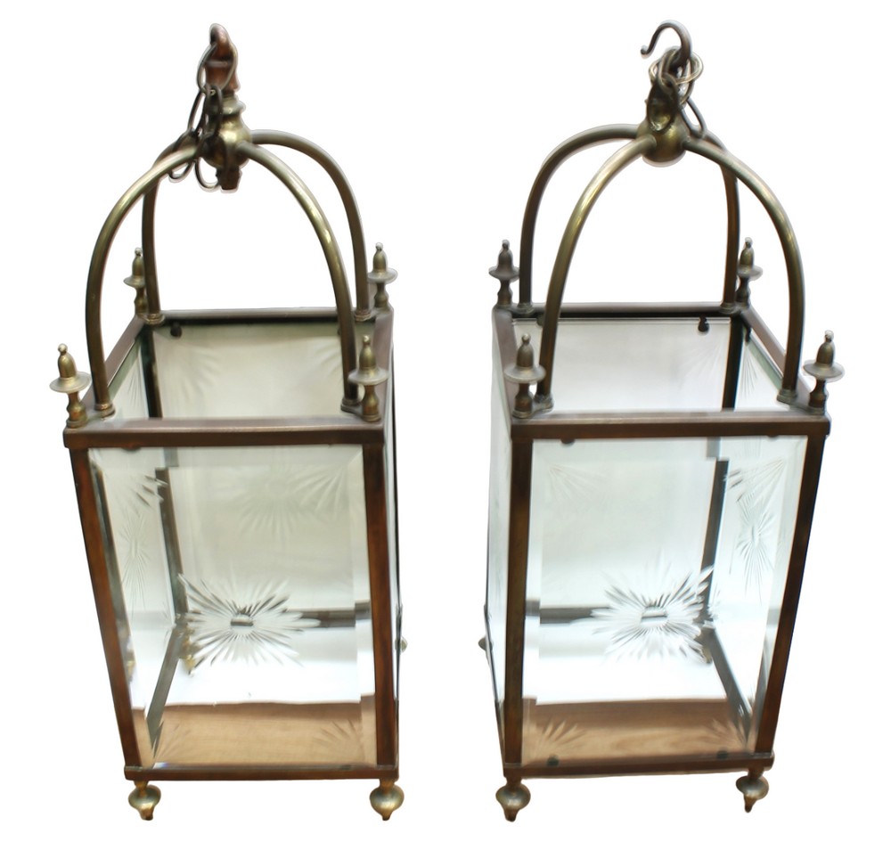 A pair of early to mid 19th Century etched glass and brass cased lanterns, brass finials and hanging