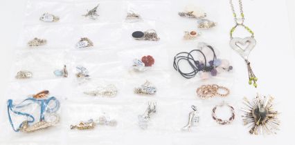 A collection of silver and stone set jewellery to include various brooches, including a stone set