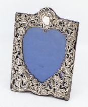 A late Victorian silver easel back photo frame, with intricate pierced design with vacant