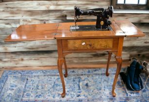 Mid 20th century mahogany cabinet sewing electric machine by Singer