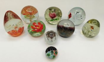 A collection of mixed 20th Century glass paperweights including a Caithness Scotland "Midas" no