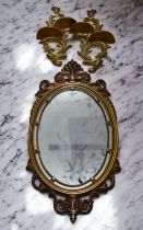 A pair of gilt shelves and a mirror (AF) (AF = As found)